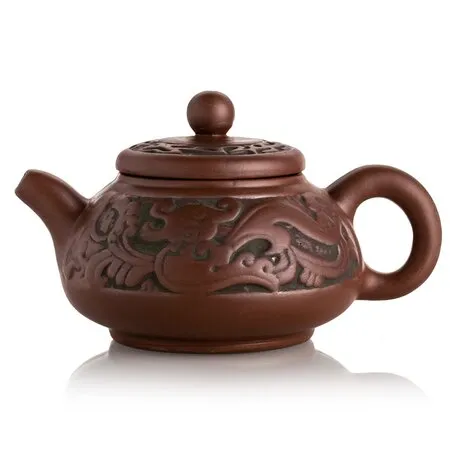 Чайник глиняный с фактурными растительными узорами, 250 мл.