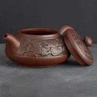 Чайник глиняный с фактурными растительными узорами, 250 мл.